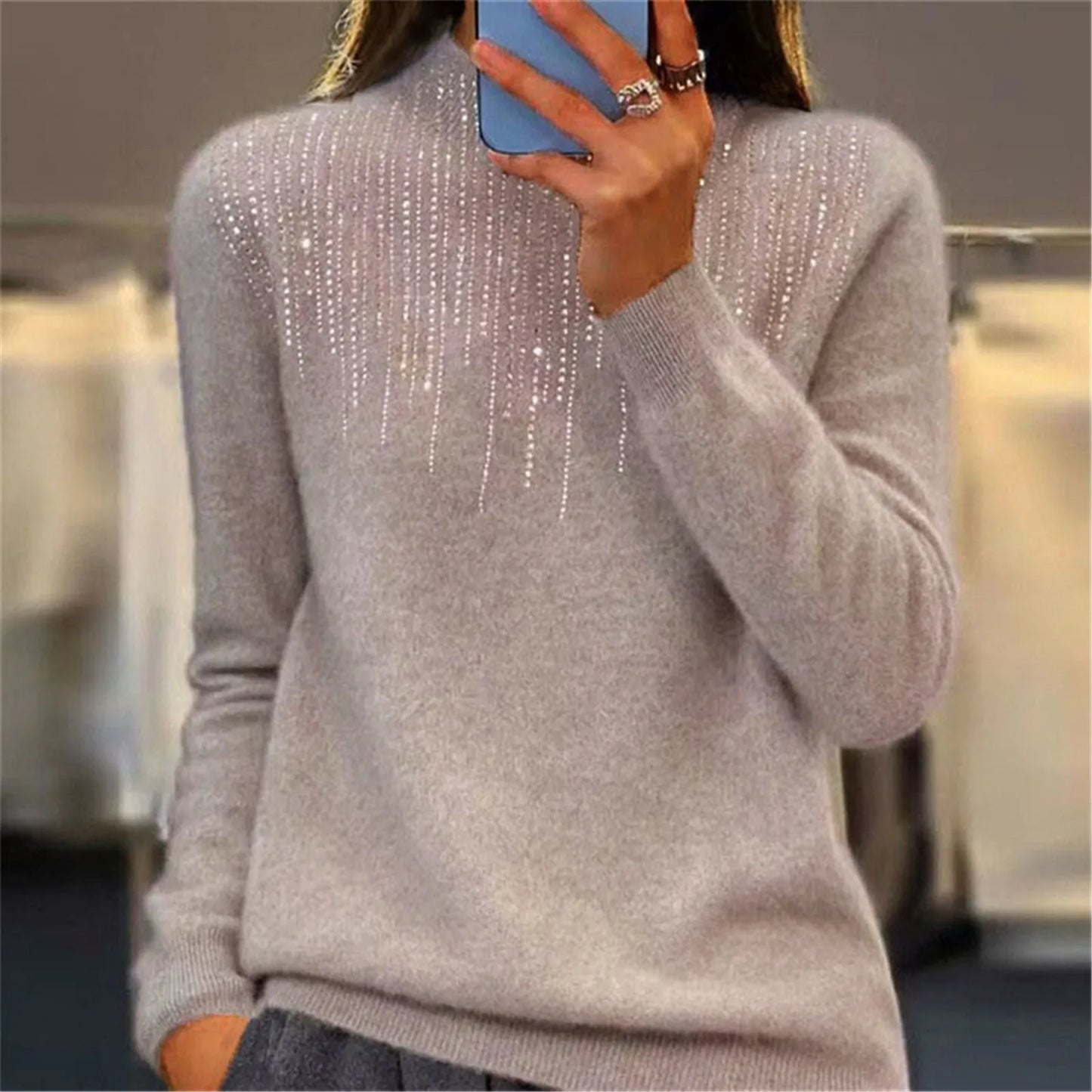 Γυναικείο πουλόβερ με ζιβάγκο και πούλιες 2025