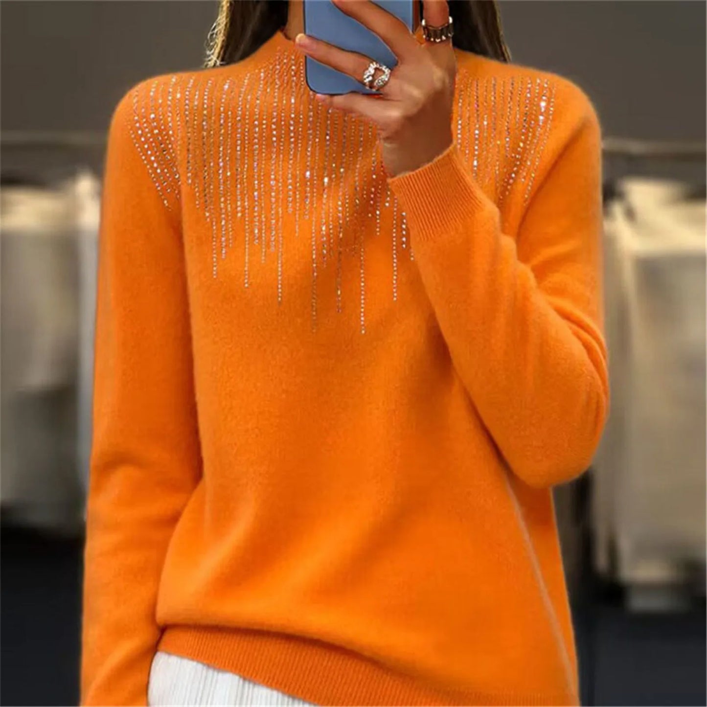 Γυναικείο πουλόβερ με ζιβάγκο και πούλιες 2025