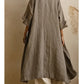 Τριπλό casual boho-chic σετ από λινό και βαμβάκι, που αποτελείται από μακρύ παλτό, αμάνικη μπλούζα και παντελόνι.